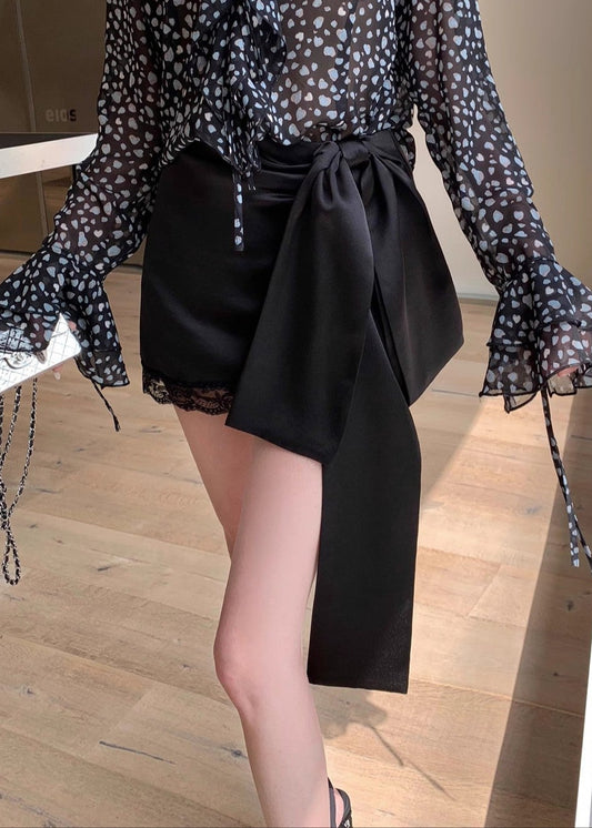 Antonina Lace Up Bow Satin Skirt In Black
