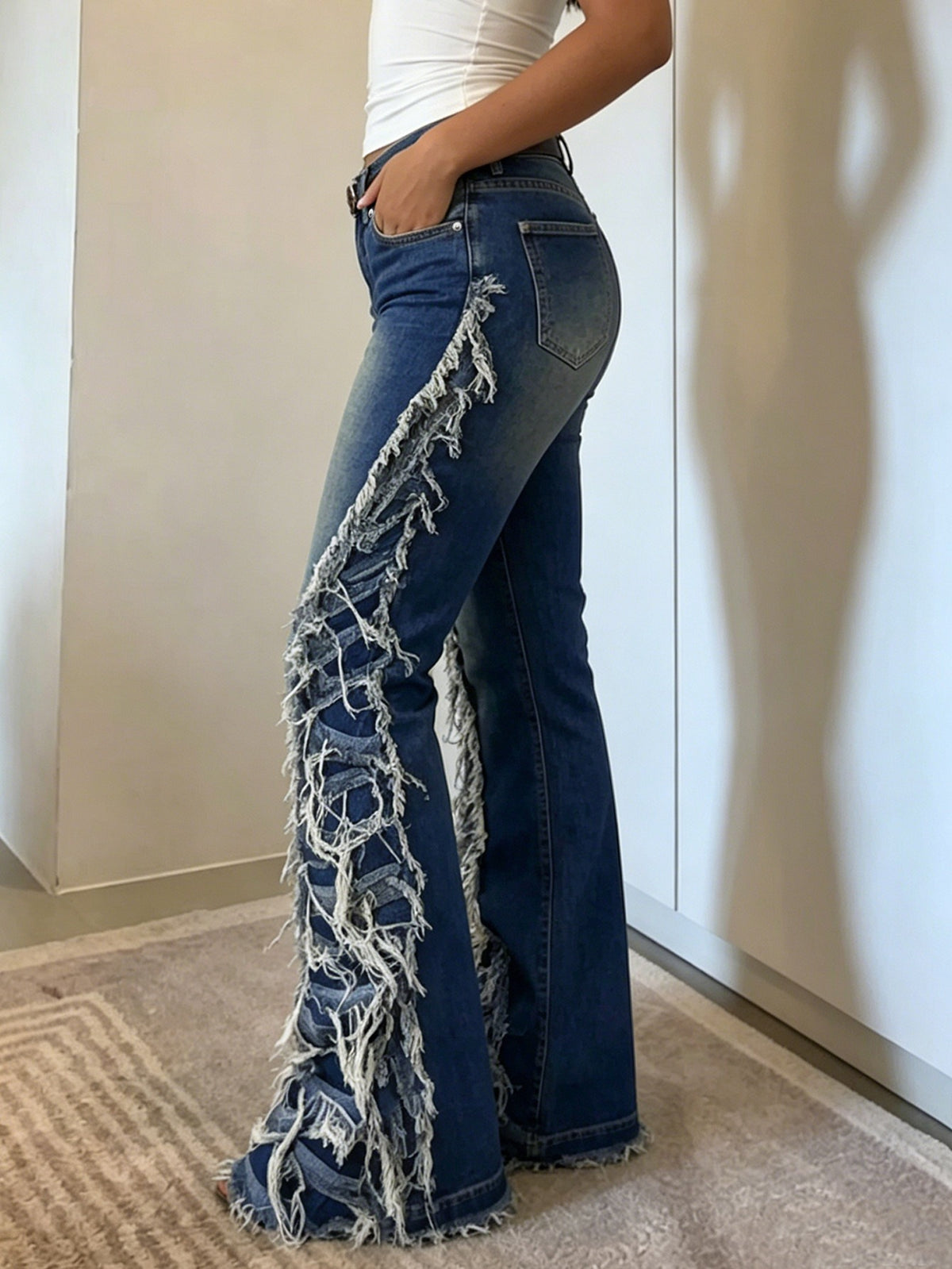 Gieta Ripped Fringe Jeans