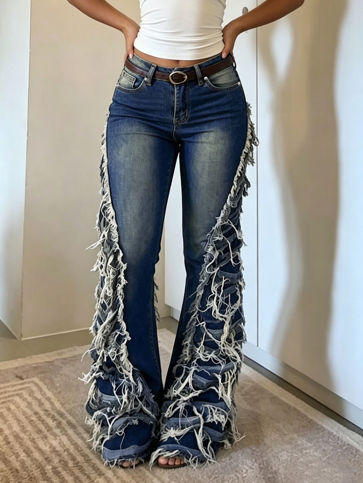 Gieta Ripped Fringe Jeans