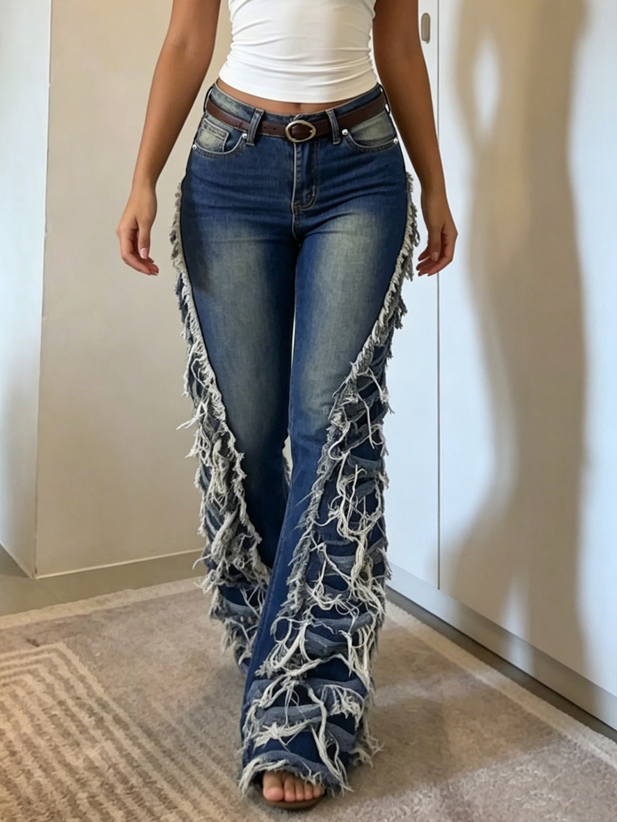 Gieta Ripped Fringe Jeans